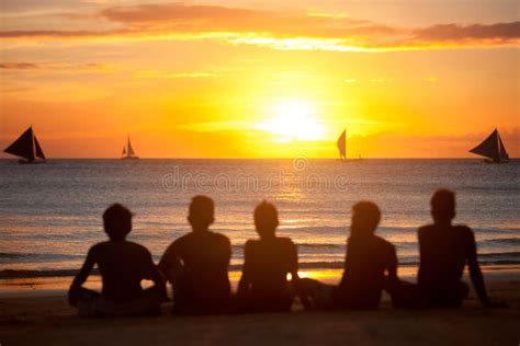 Silhouette Of Group Of Friends In Sunset Stock Photo - Image: 55997018