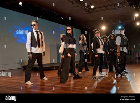 Group of young boys and girls performing a modern dance Stock Photo - Alamy