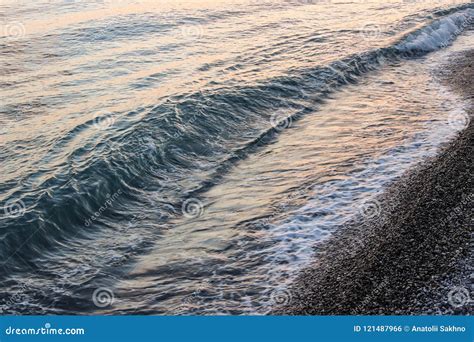 Wave Breaker on the Beach at Sunset. Stock Photo - Image of coast, seascape: 121487966