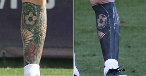 Lionel Messi shows off extreme black ink work on his magical left leg at Argentina training ...