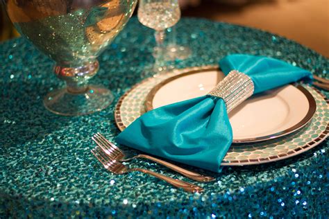 Turquoise Bling and Turquoise napkin held with Rhinestone napkin band creates a tasteful amount ...