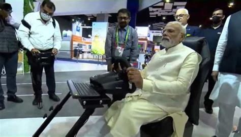 PM Narendra Modi drives car in Europe virtually from Delhi using 5G ...