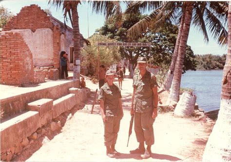 Rhona Knox and Friend in a Bombed-out Village near Qui Nhon. (With images) | Vietnam, Vietnam ...