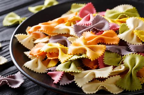 Beautiful Italian Uncooked Colored Farfalle Pasta Close-up. Hori Stock Photo - Image of ...