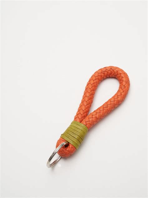 key ring - orange in 2022 | Key rings, Rings, Braided leather