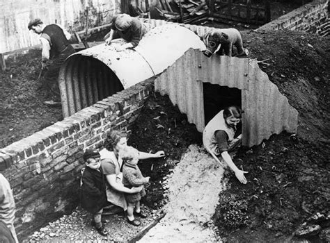 Assembling Anderson shelters 1940 | Anderson shelter, World war, London ...