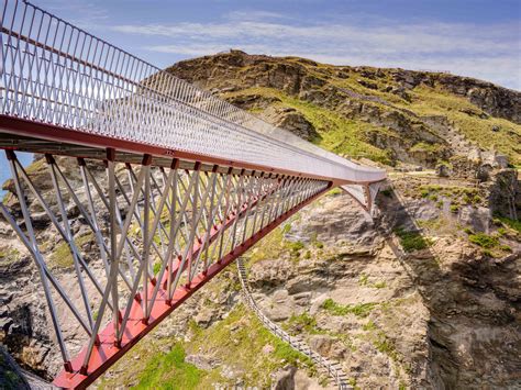 Tintagel Castle Bridge in Cornwall has a gap where it meets in the middle | Castle, Footbridge ...