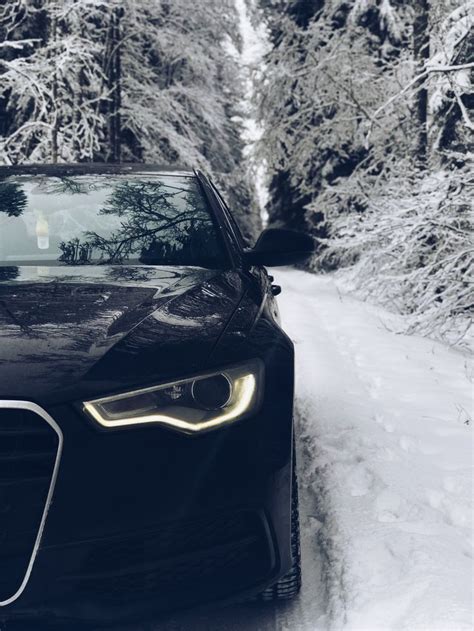 Black Car Parked in Snow | Cool Car Picture