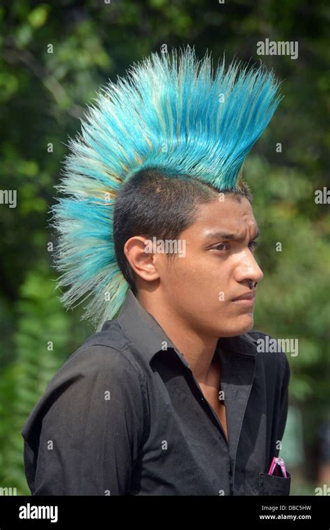 Portrait of a young man with a colorful Mohawk haircut at Union Square ...