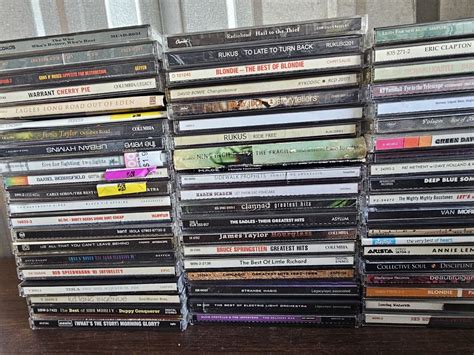 Lot Of 61 Rock Music CD's In Cases w/ AC/DC Poison GNR Bowie Chili ...