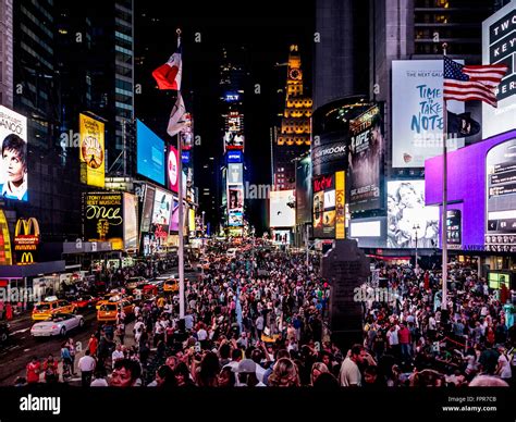 Crowd of people in Times Square at night, New York City, USA Stock ...