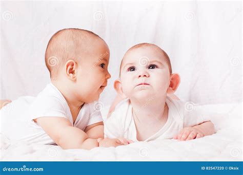 Babies talking, humor stock photo. Image of playing, cheerful - 82547220