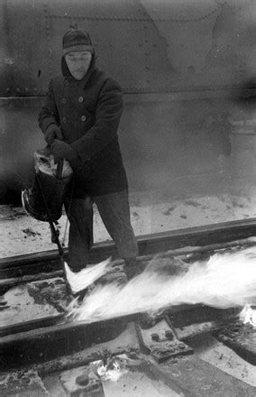 Man Blow Torching Railway During Long Editorial Stock Photo - Stock Image | Shutterstock