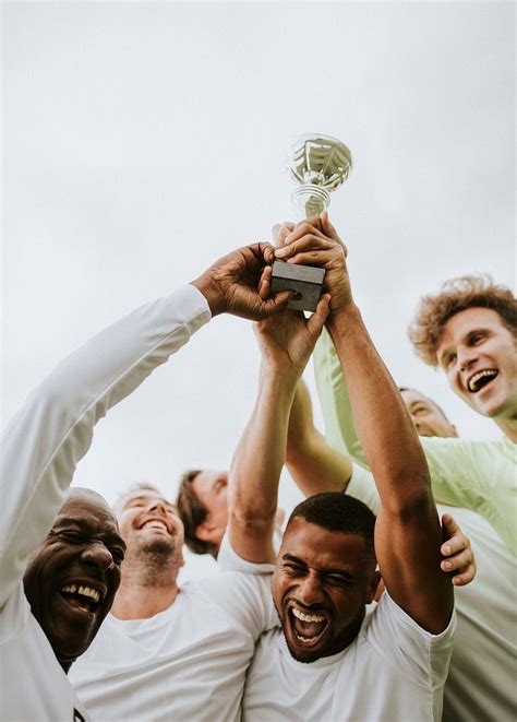 Soccer team celebrating their victory | Photo - rawpixel