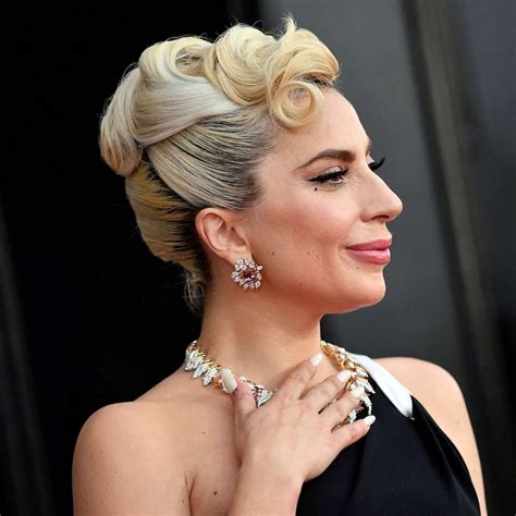 Lady Gaga reacts to 2023 Oscar nomination for her song 'Hold My Hand' - ABC News