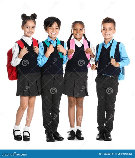 Happy Children in School Uniform on White Stock Image - Image of pants, happy: 158200141