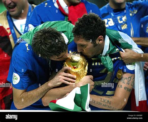 Italys marco materazzi barzagli kiss the fifa world cup hi-res stock ...