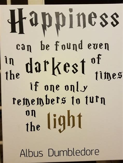 a sign that says happiness can be found even in the darkest times if ...