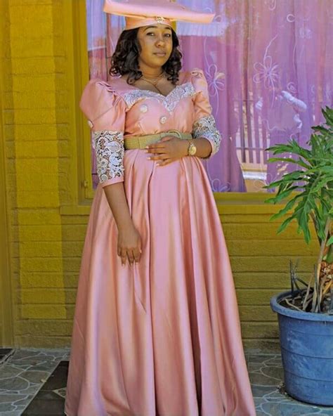 Clipkulture | Beautiful Peach Herero Dress With Lace Detail and Headdress