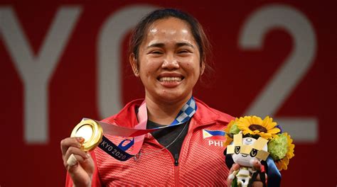 Philippines weightlifter wins the country's first gold medal at Tokyo ...