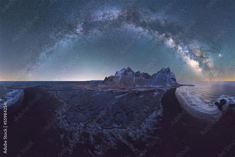 Amazing view of snowy mountain under starry sky at night Stock Photo | Adobe Stock