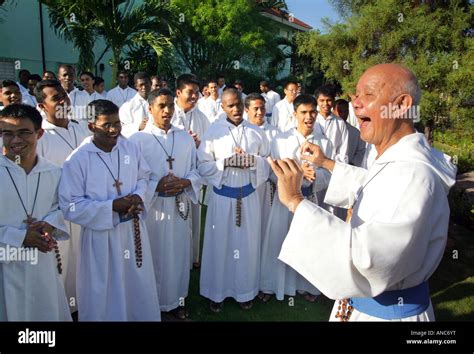 Father Richard Ho Lung (right), founder and head of the roman catholic congrigation ...