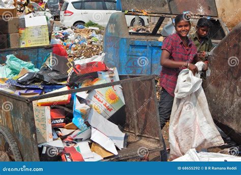 Indian Rag Pickers Search for Recyclable Material in the Garbage ...