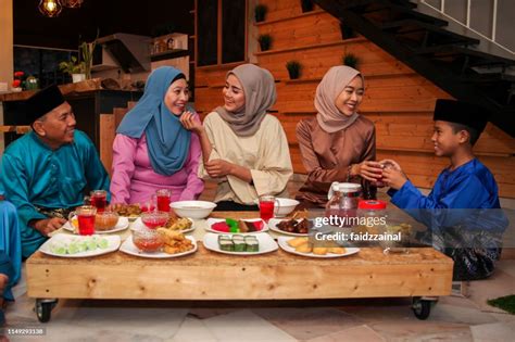 A Family Hari Raya Aidilfitri Eidulfitr Meal And Celebration In Malaysia High-Res Stock Photo ...