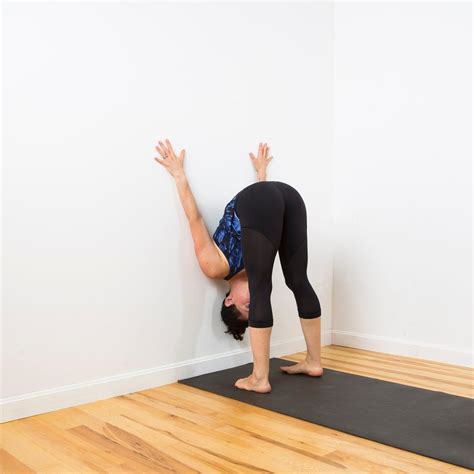 Standing Forward Bend | Wall yoga, Yoga training, Yoga sequences