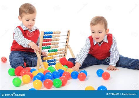 Two Cute Little Boys Playing With Toys Stock Image - Image of childhood, boyhood: 17444473