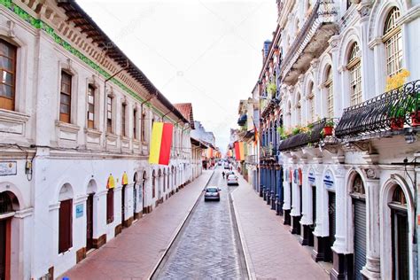 Streets of Cuenca Ecuador during the festivities with city flags — Stock Photo © pxhidalgo #12464093