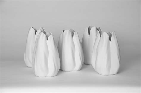 Dimensions: H 28 cm x diameter 18 cm Material: white porcelain Finish: inside glossy, outside ...