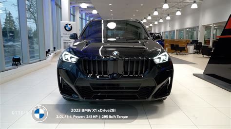 The New BMW X1 xDrive28i (2023) - Black Sapphire with Coral Red / Black ...