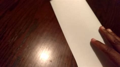 How to fold a sheet of paper (horizontally) - YouTube
