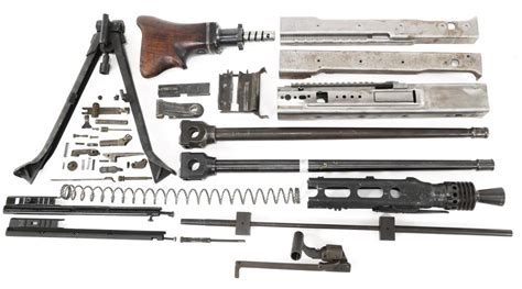 Sold at Auction: GERMAN MG-42 MACHINE GUN PARTS KIT