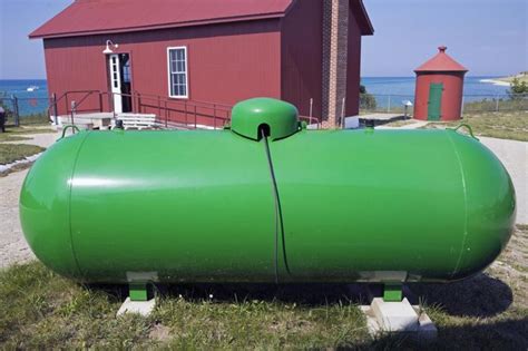 500-Gallon Above-Ground Propane Tank Installation and Painted Green