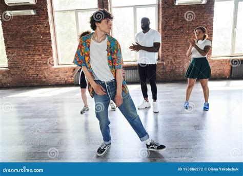 Young Hip-hopper Dancing for Friends in Studio Stock Photo - Image of ...