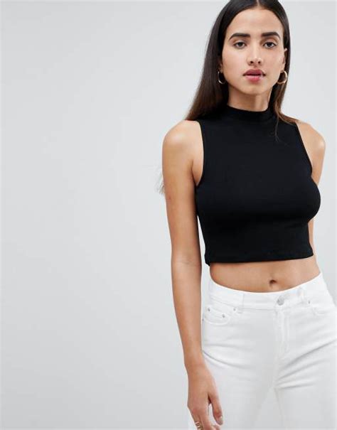 ASOS DESIGN sleeveless crop top with turtleneck in black | ASOS