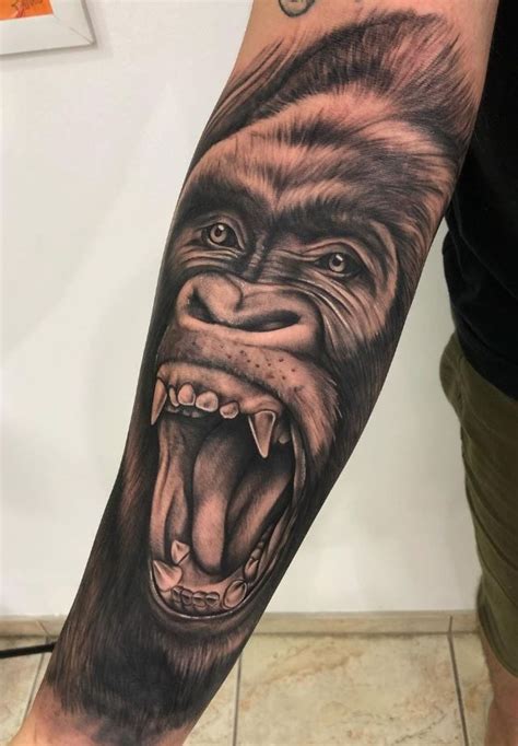 Gorilla Tattoo | Gorilla tattoo, Arm tattoos lettering, African tattoo