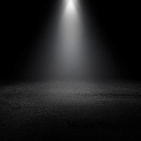 Download Spotlight Shining Down Into A Grunge Interior for free | Black background wallpaper ...