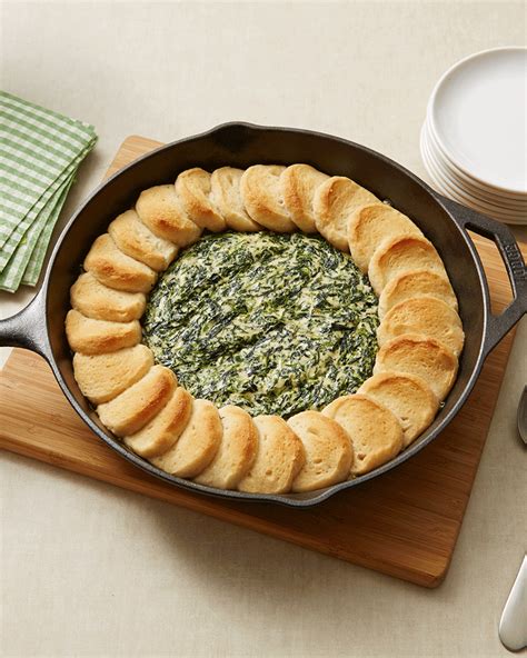 3-ingredient Skillet Spinach Artichoke Dip with french bread baked on top for easy dipping. You ...