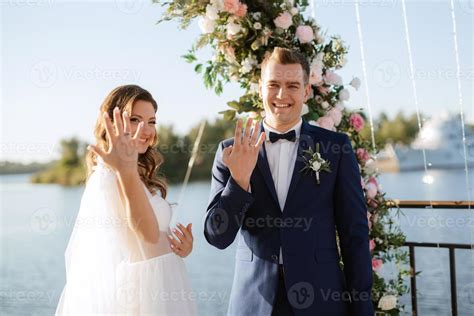 wedding ceremony on a high pier near the river 21543903 Stock Photo at ...