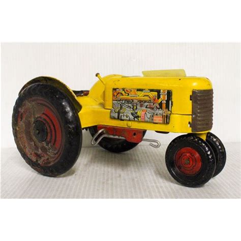 TOY METAL TRACTOR 11 INCHES PRESSED STEEL