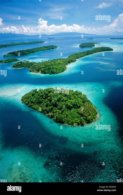 Aerial view of islands with fringing coral reefs, New Georgia, Solomon Islands, Pacific Ocean ...