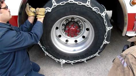 TireChain.com---Truck With Cam Tire Chains Installation - YouTube