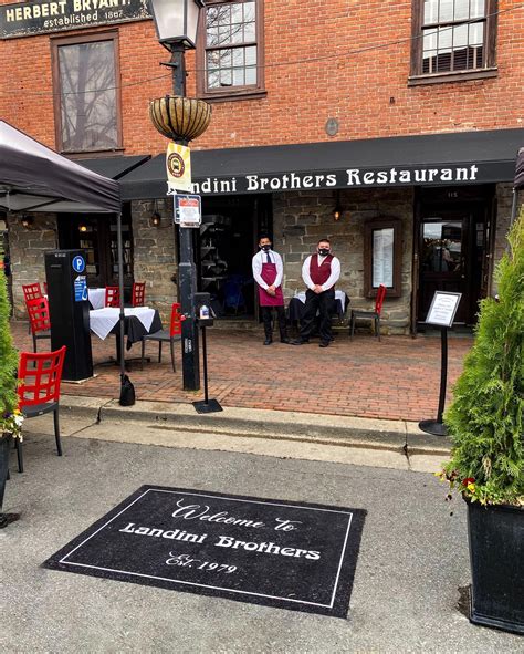 Landini Brothers Restaurant – Still Setting the Standard – Old town crier