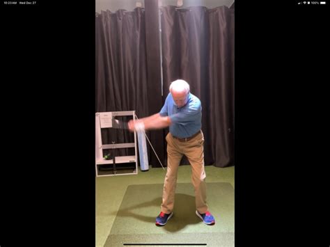 Should the wrists hinge vertically or should trail wrist go into extension on backswing ...