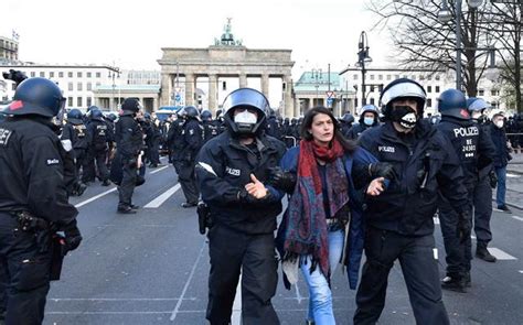 Police clash with protesters as Germany passes virus law | Jordan Times