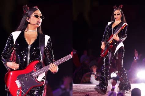 H.E.R. Brings Guitar-fueled Glamour to Super Bowl 2024 Halftime Show in Slick Catsuit With Usher