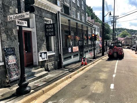 Ellicott City Main Street reopens, with eye toward rainy skies - WTOP News